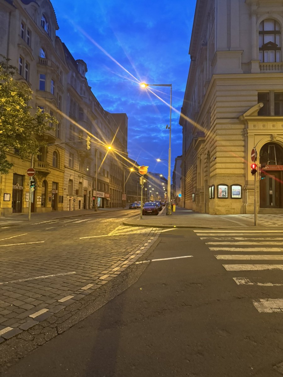 Street lamps and Prague architecture at dusk