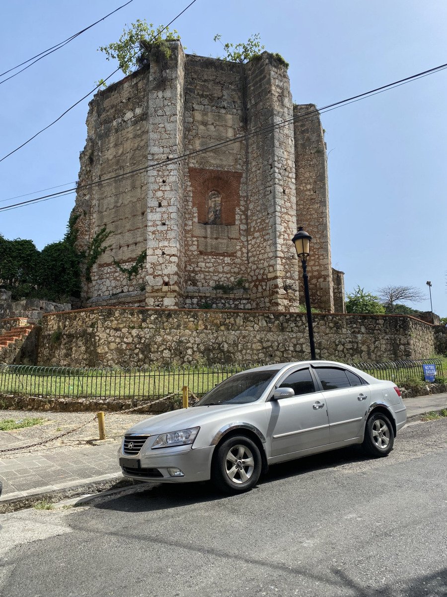 Wider view of the San Francisco ruins and surrounding street.