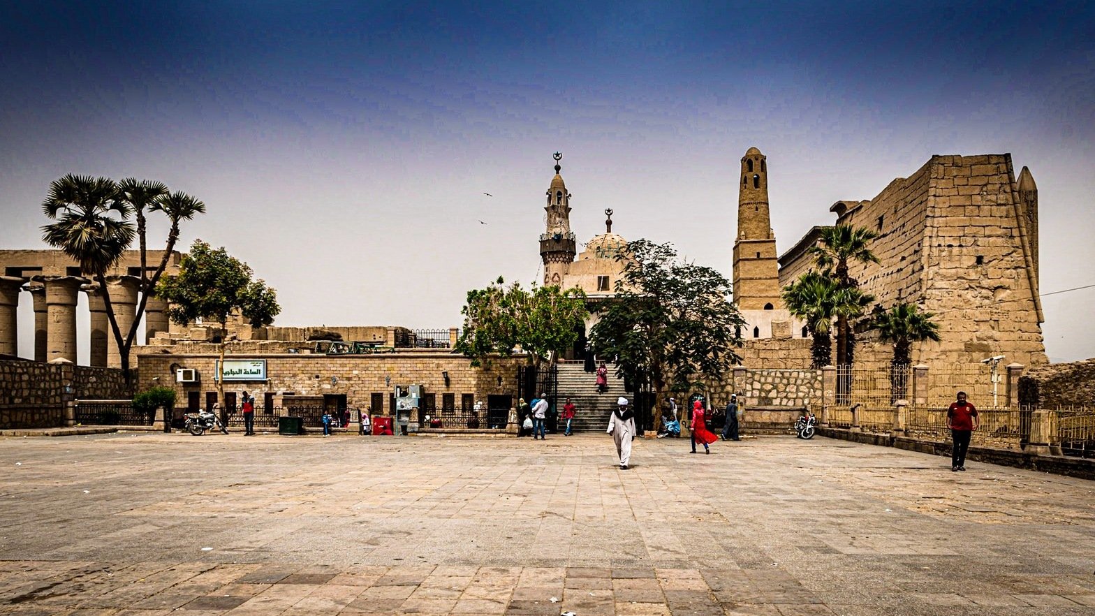 Luxor Temple entrance and surrounding city.