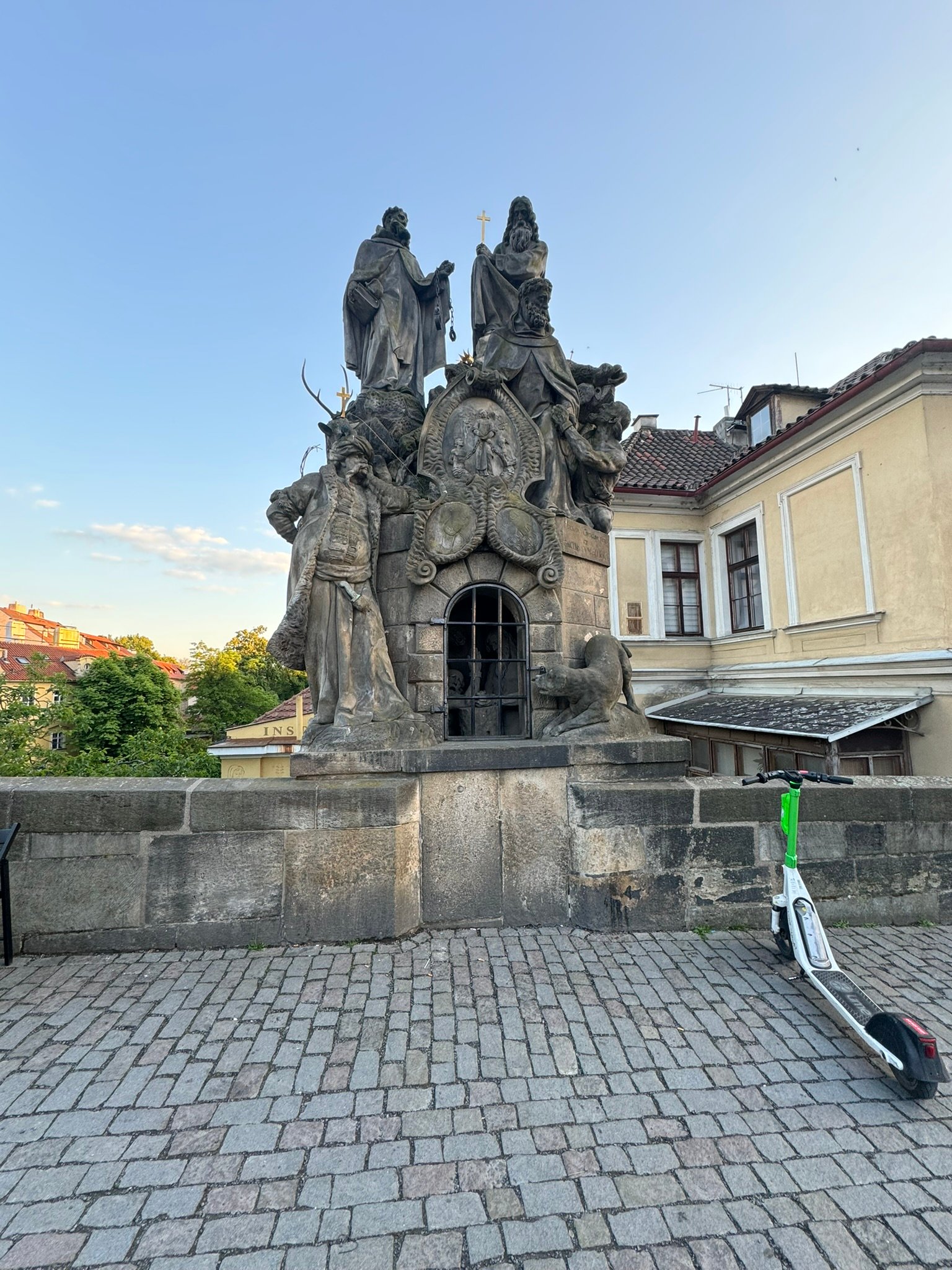 Stone sculpture beside Charles Bridge
